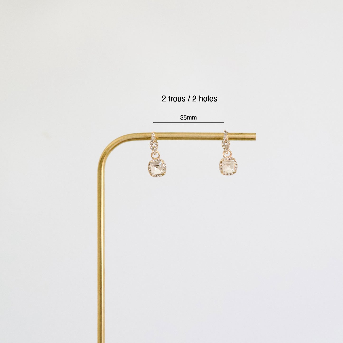 Porte boucles d'oreilles doré