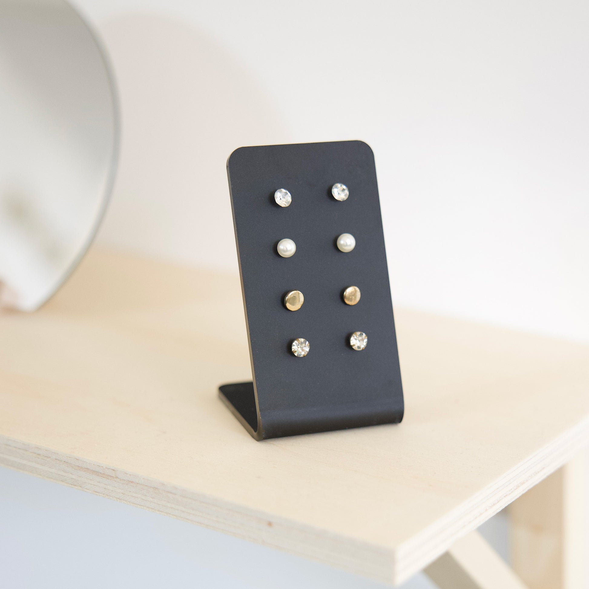 Black earring display Makk Design