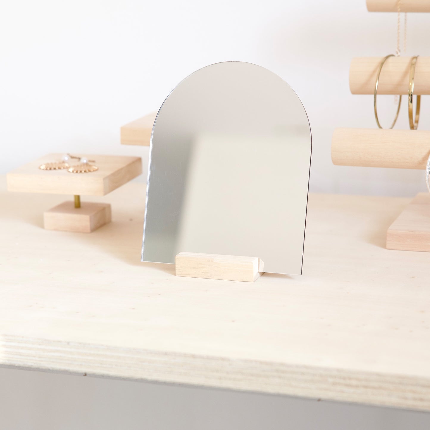 Rounded mirror for jewelry store