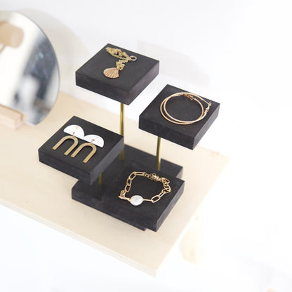 Black wooden jewelry display for brands