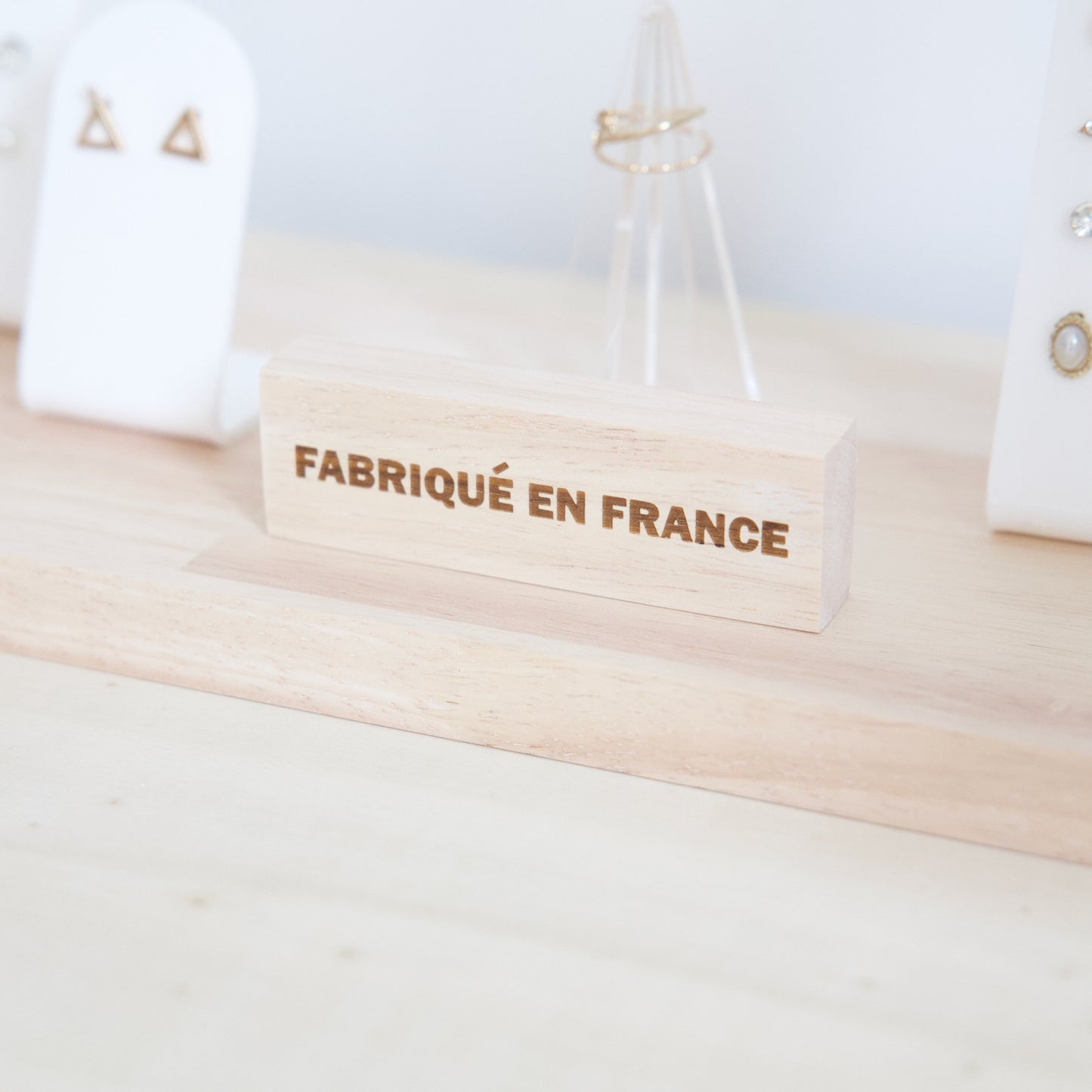 wooden signage engraved "fabrique en france" (made in france)