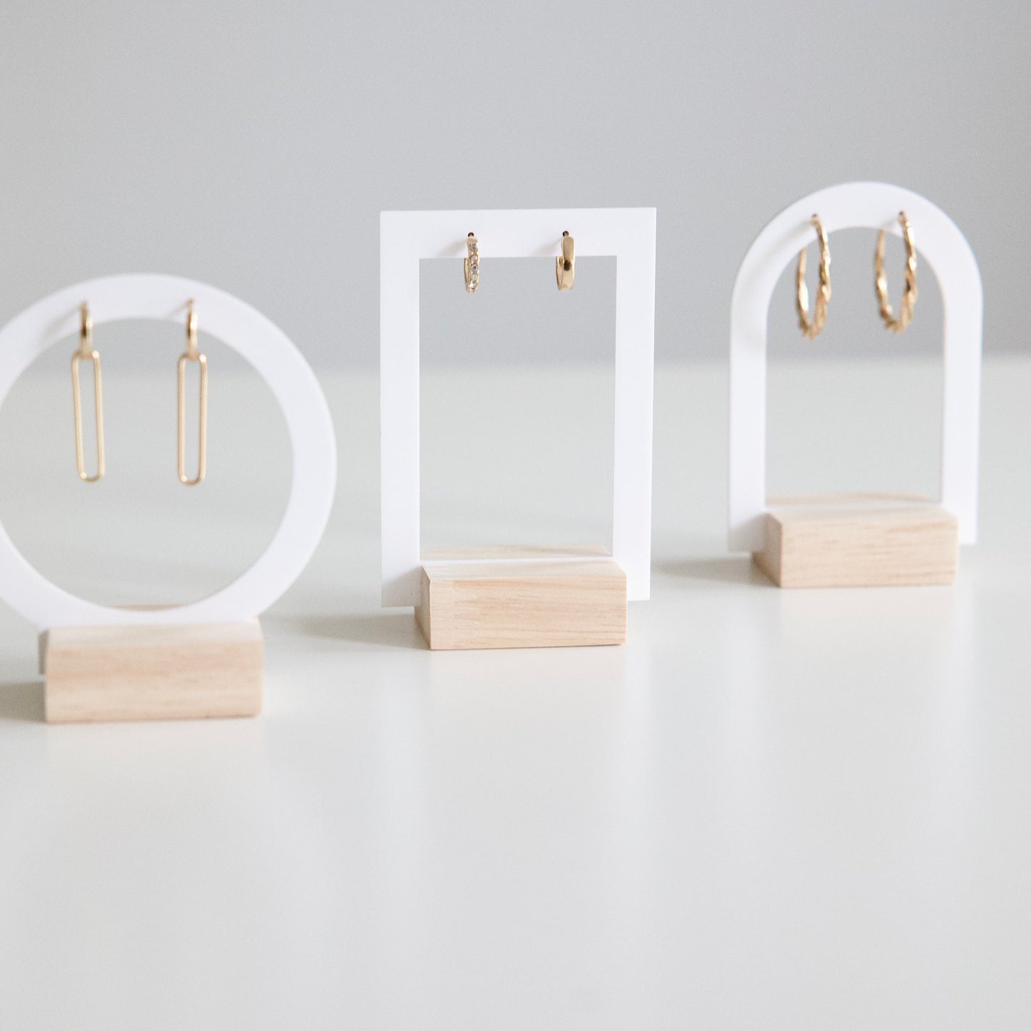 Set of 3 earring displays in white acrylic and Wood - Jewelry displays for boutiques and jewelry brands.