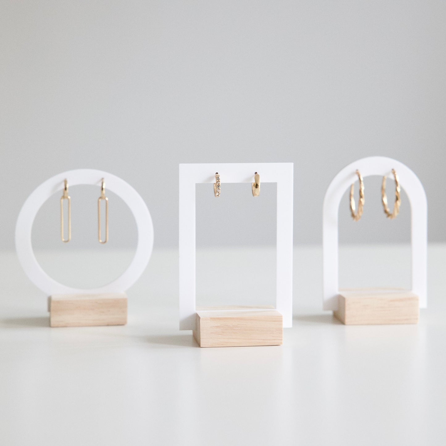 Set of 3 earring displays in white acrylic and Wood - Jewelry displays for boutiques and jewelry brands.