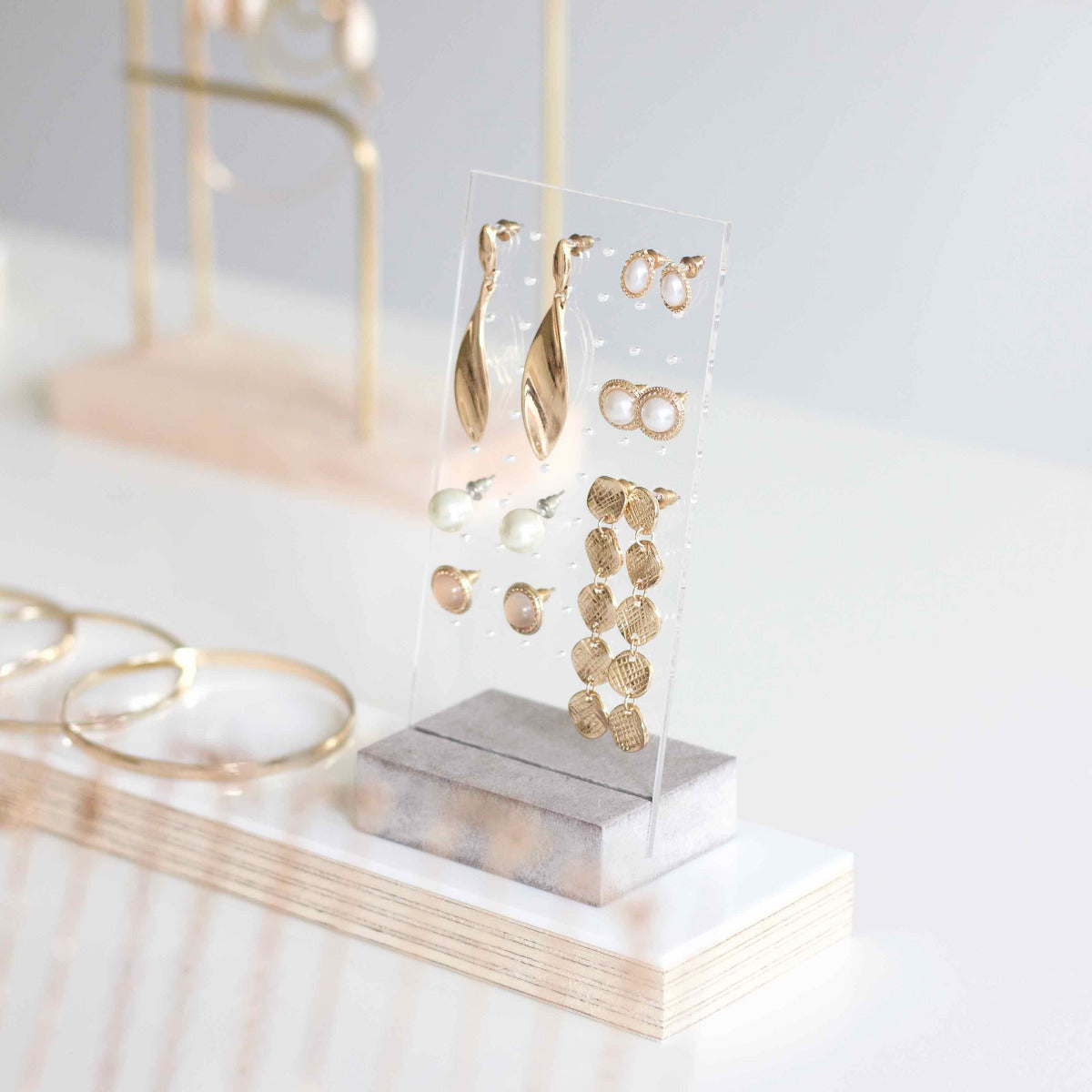 Display stand for earrings and ear studs.