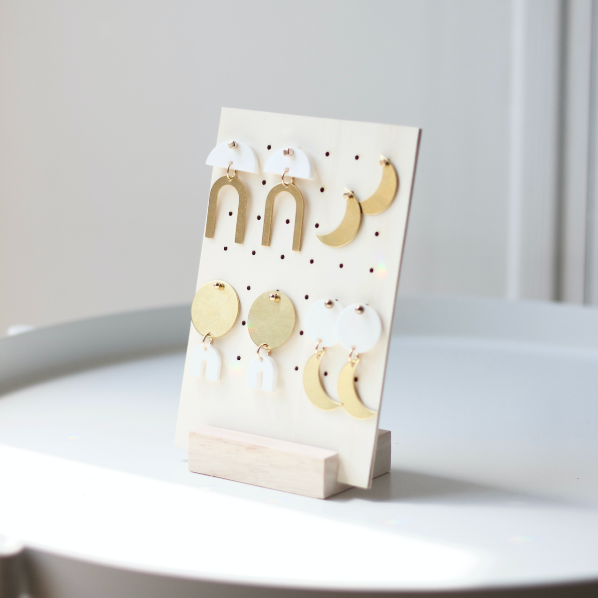 Wooden display for earrings