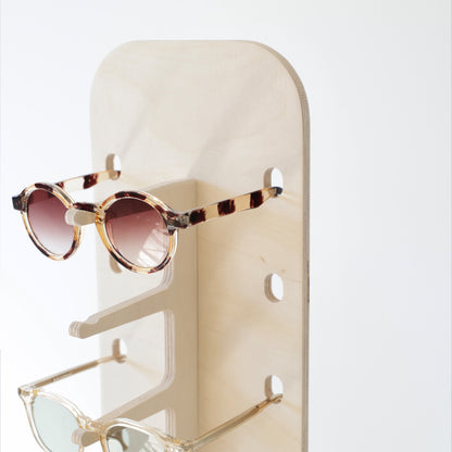 Présentoir JAMIE petit format, style moderne, idéal pour boutiques et salons.